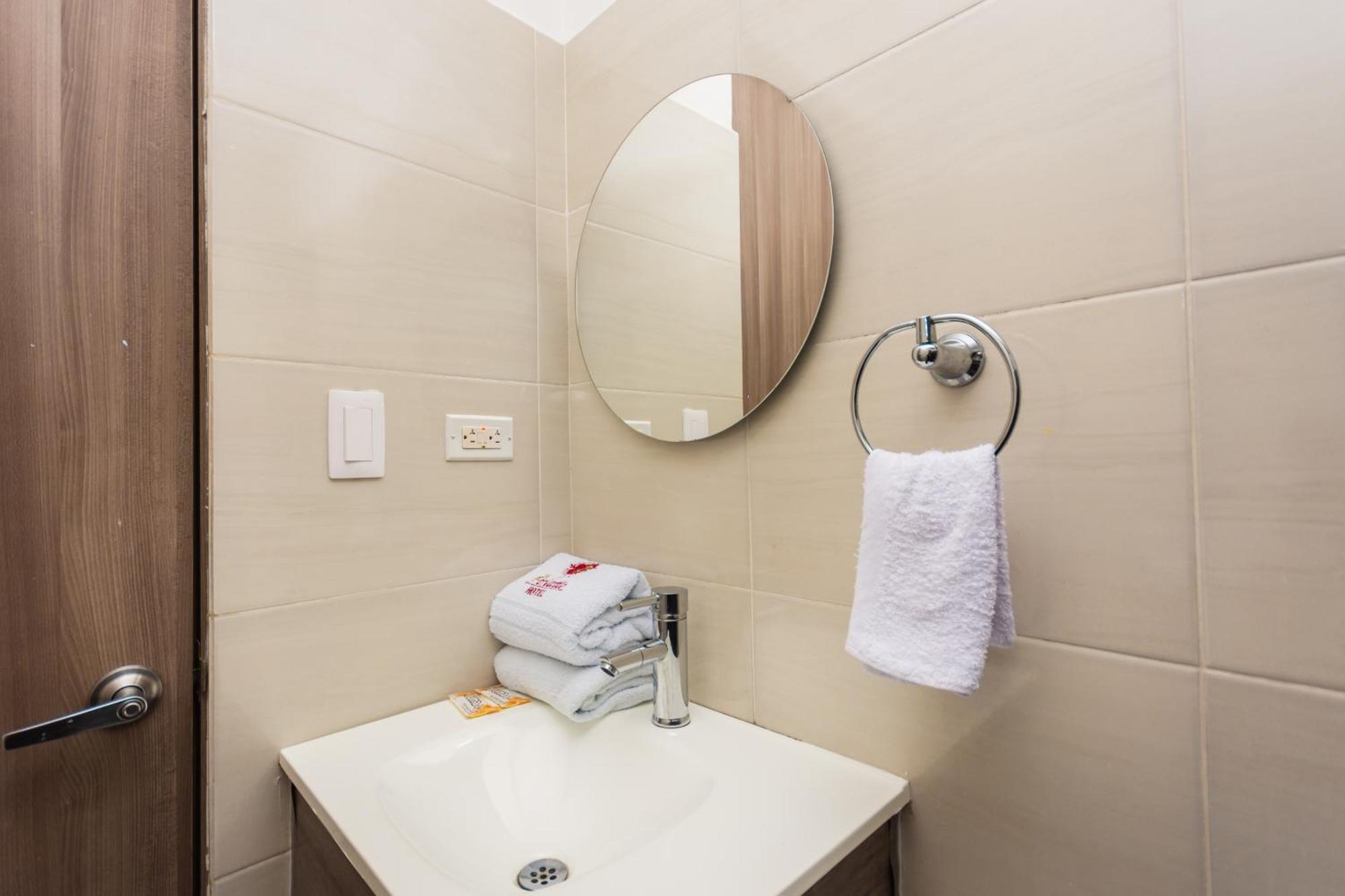 Ayenda 1250 Perlatto Hotel Bello Bagian luar foto