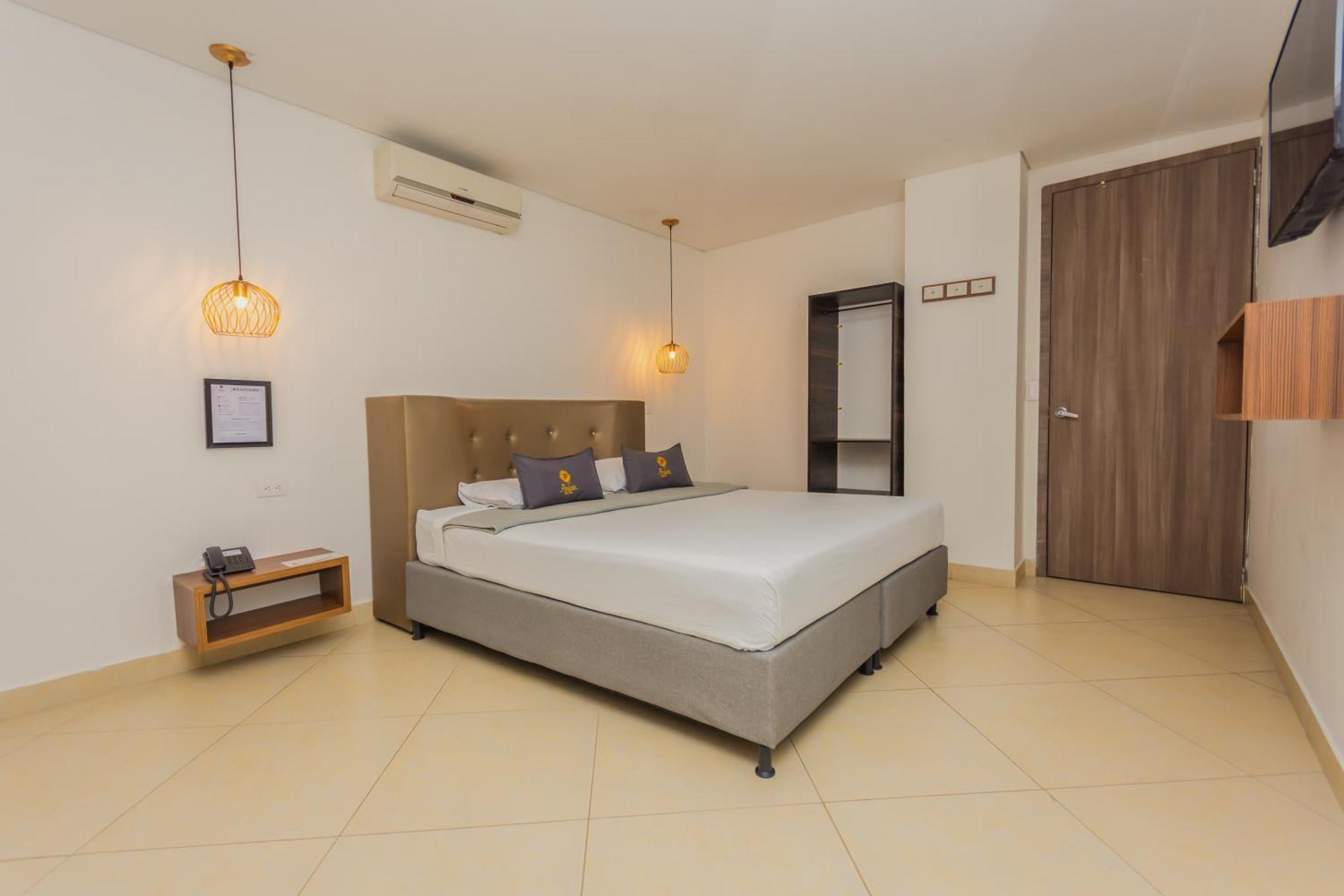 Ayenda 1250 Perlatto Hotel Bello Bagian luar foto
